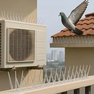 Bird spike AC unit installation close-up
